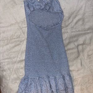 blue floral dress. open front. closed back